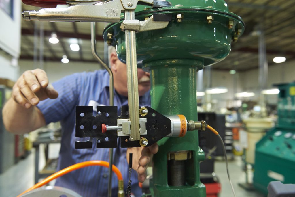 Photo of worker working on a machine