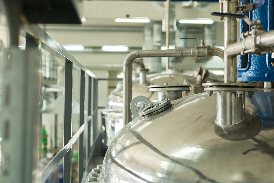 Tanks for chemical mixing on chemical plant. Concept Manufacturing