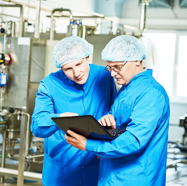 pharmaceutical technician male workers in water preparation