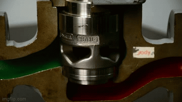 Hand inspecting valve trim.